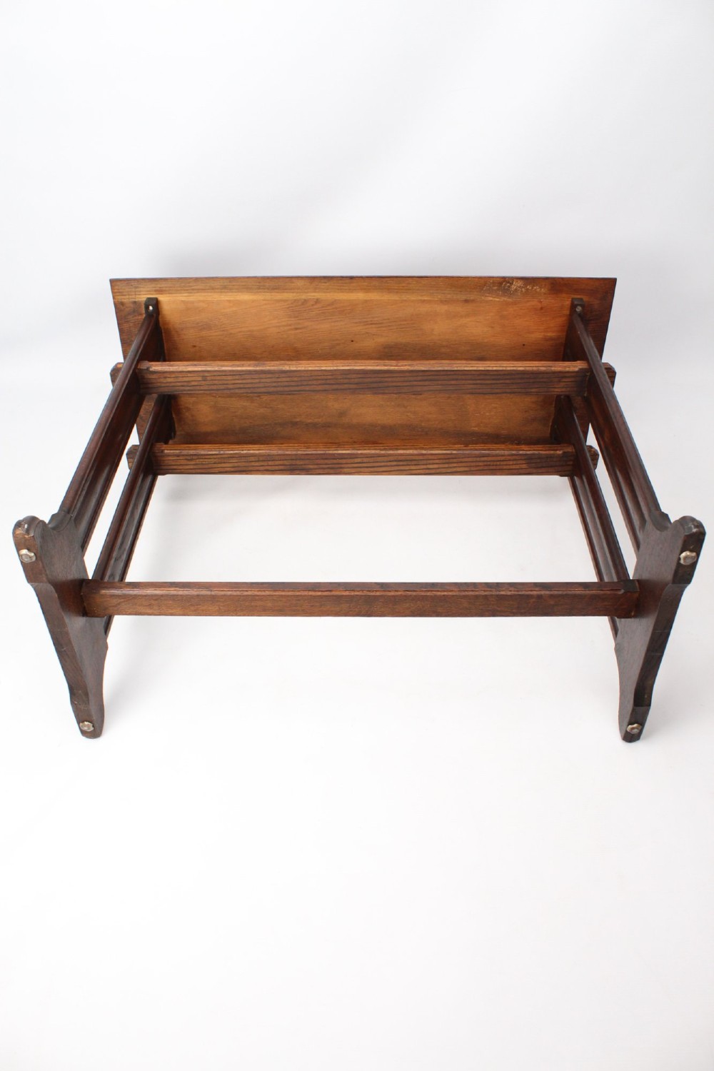 An Edwardian Arts and Crafts medium brown oak side table featuring double upright supports, exposed joint details, and a low stretcher. View XIII