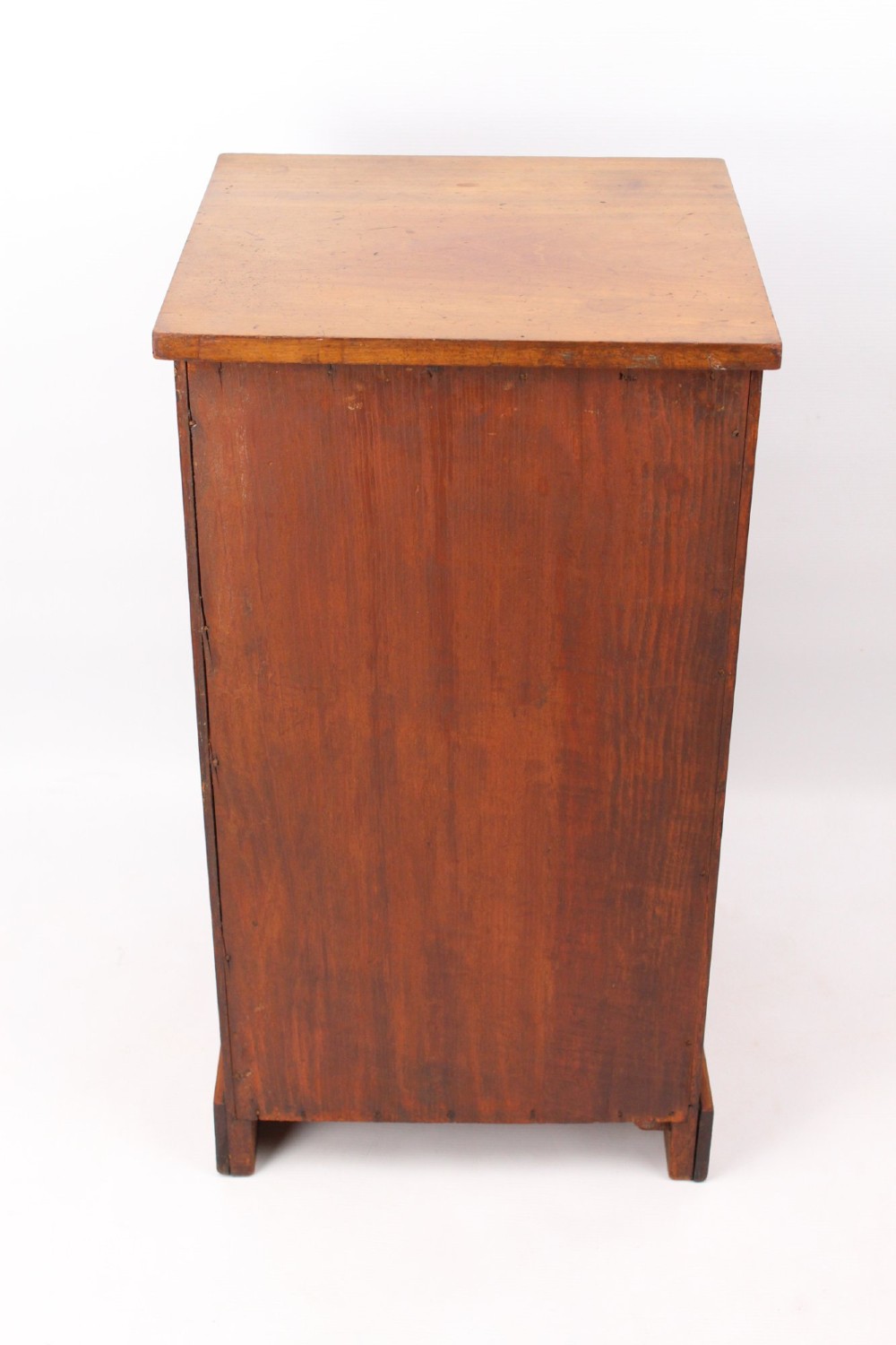 A small Edwardian mahogany bedside cabinet featuring fine boxwood string inlay on the single cupboard door and a brass drop handle. View V