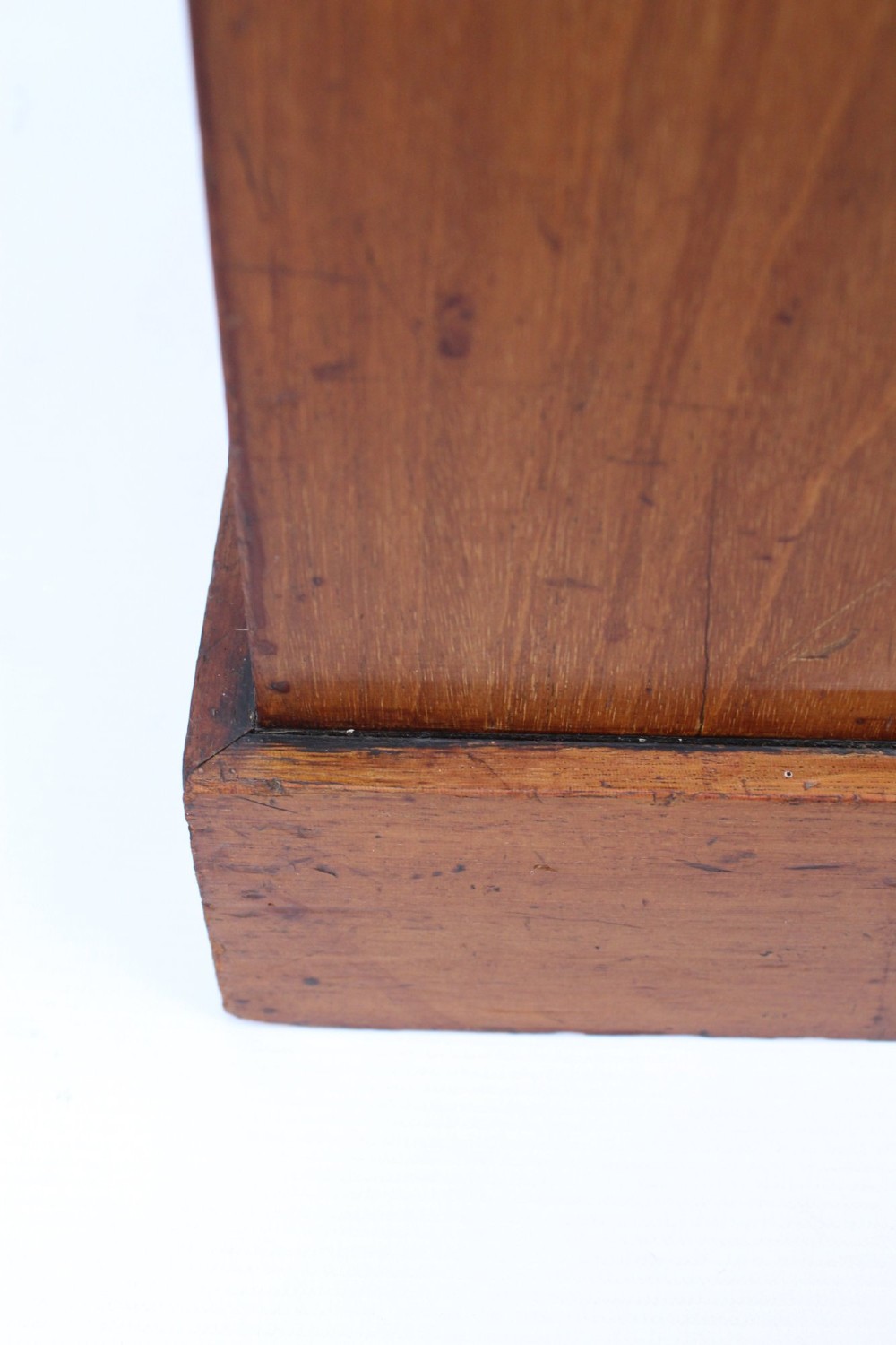 A small Edwardian mahogany bedside cabinet featuring fine boxwood string inlay on the single cupboard door and a brass drop handle. View VIII