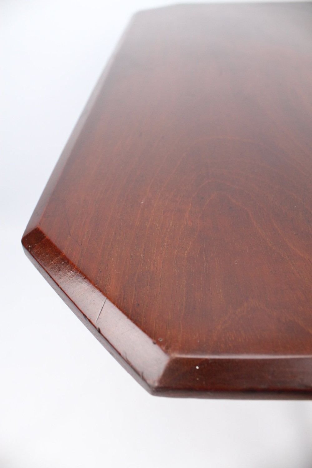 A small Victorian mahogany Sutherland table shown folded with two drop leaves, slender turned spindle legs, and a low stretcher base. View IX