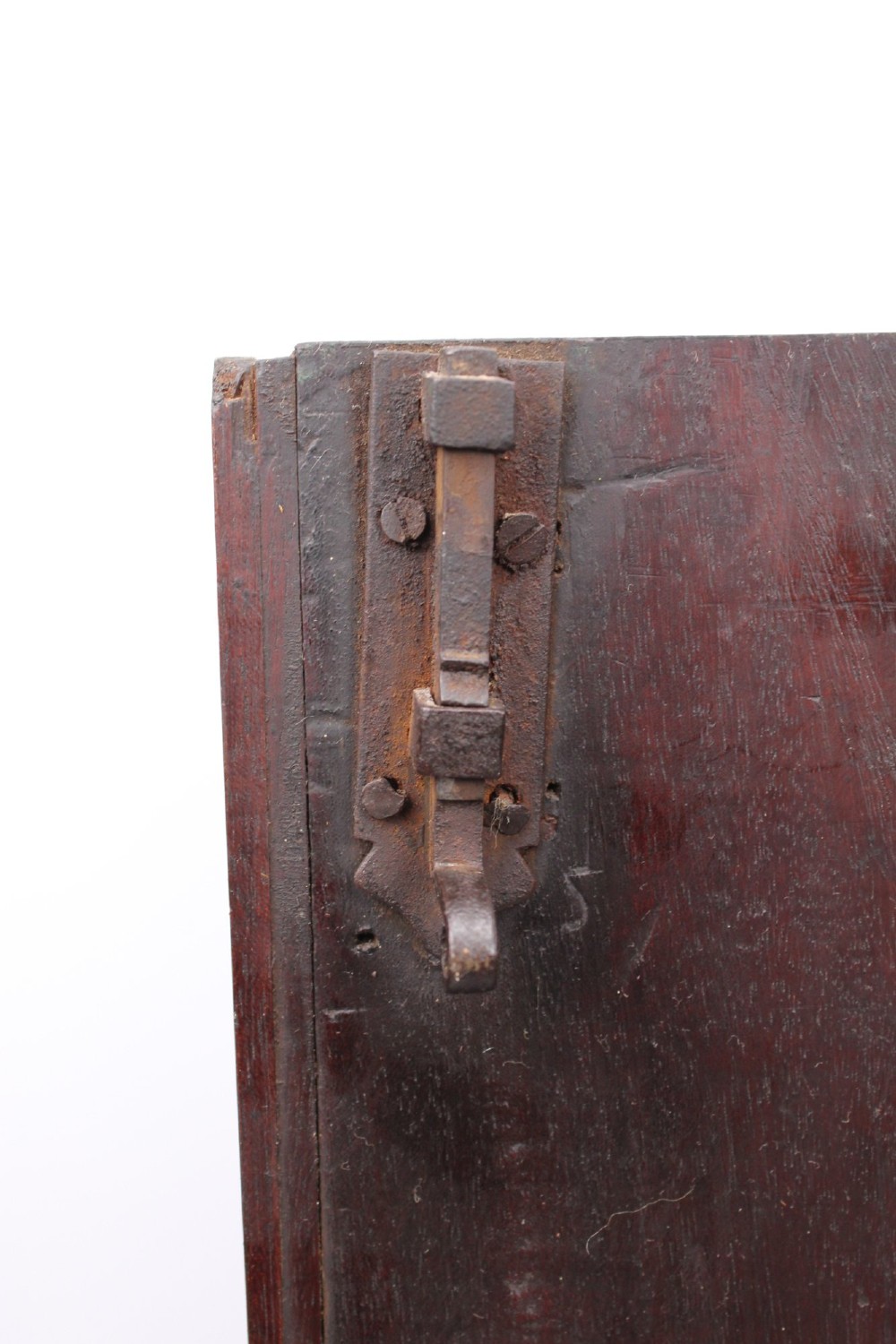 A Georgian mahogany bow front corner cupboard with twin curved doors and decorative brass hinges and keyhole escutcheons. View VII
