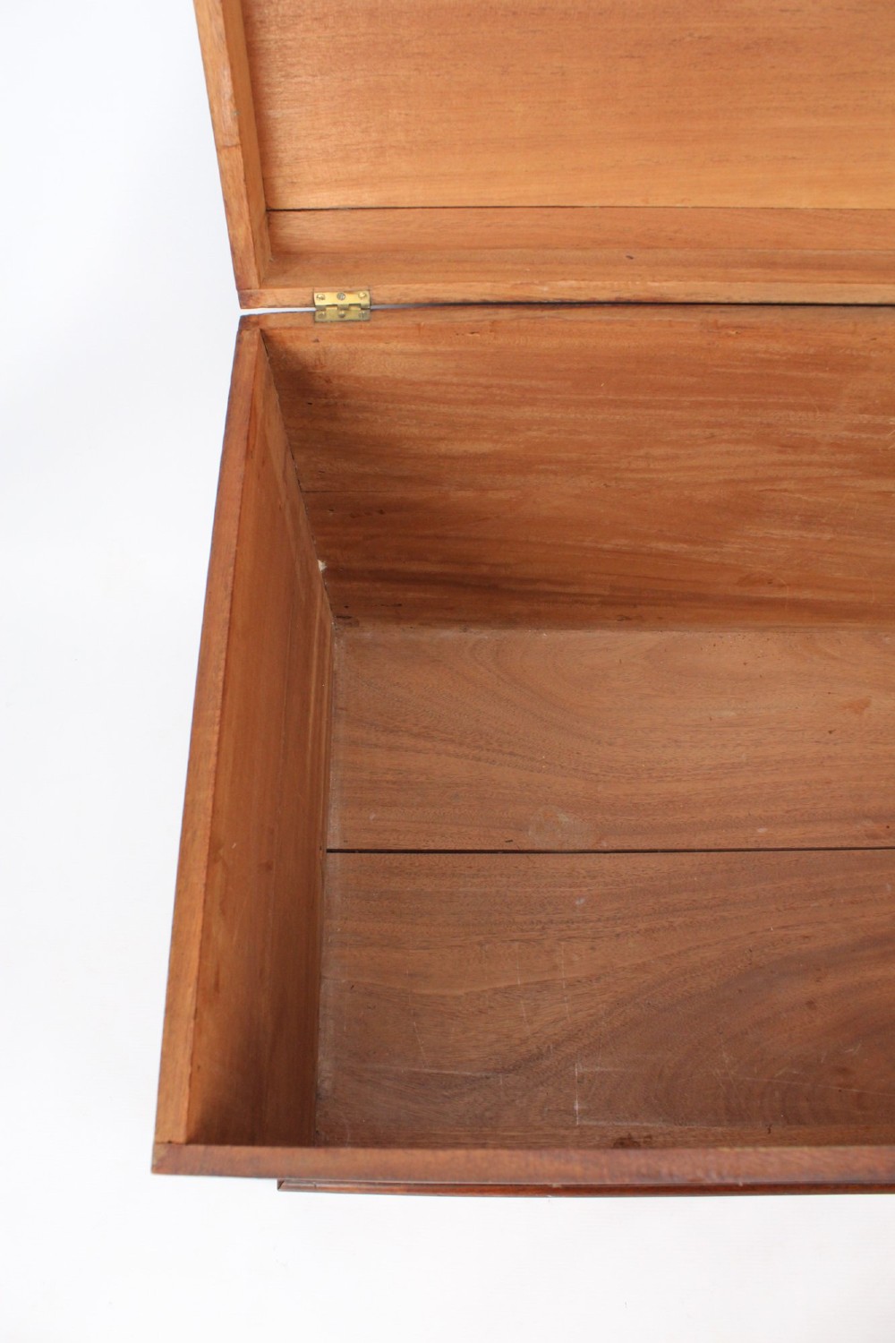 A rectangular Victorian mahogany storage chest featuring exposed dovetail corner joints, a flat hinged lid, and a central brass handle. View VII