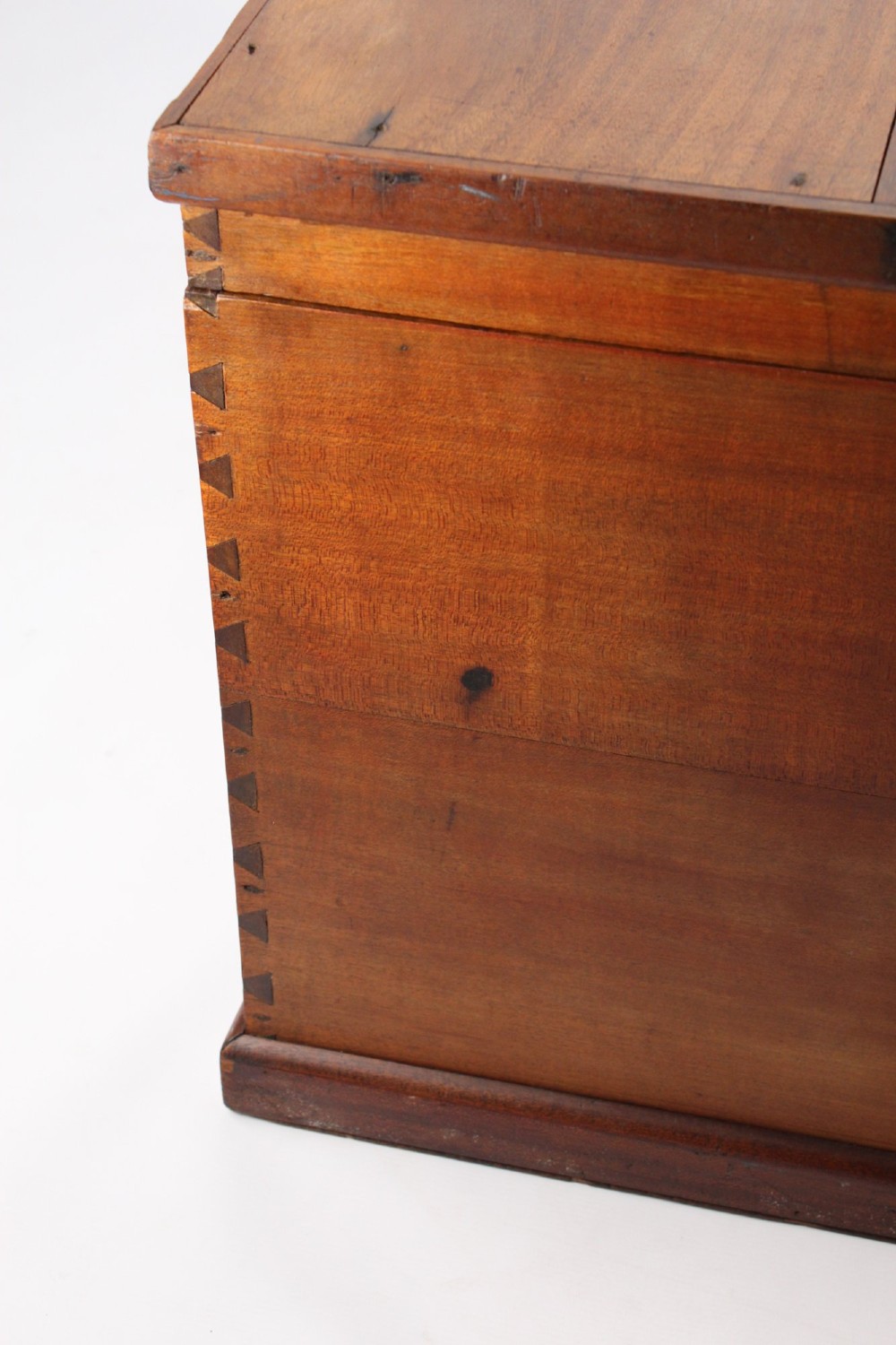 A rectangular Victorian mahogany storage chest featuring exposed dovetail corner joints, a flat hinged lid, and a central brass handle. View XIII