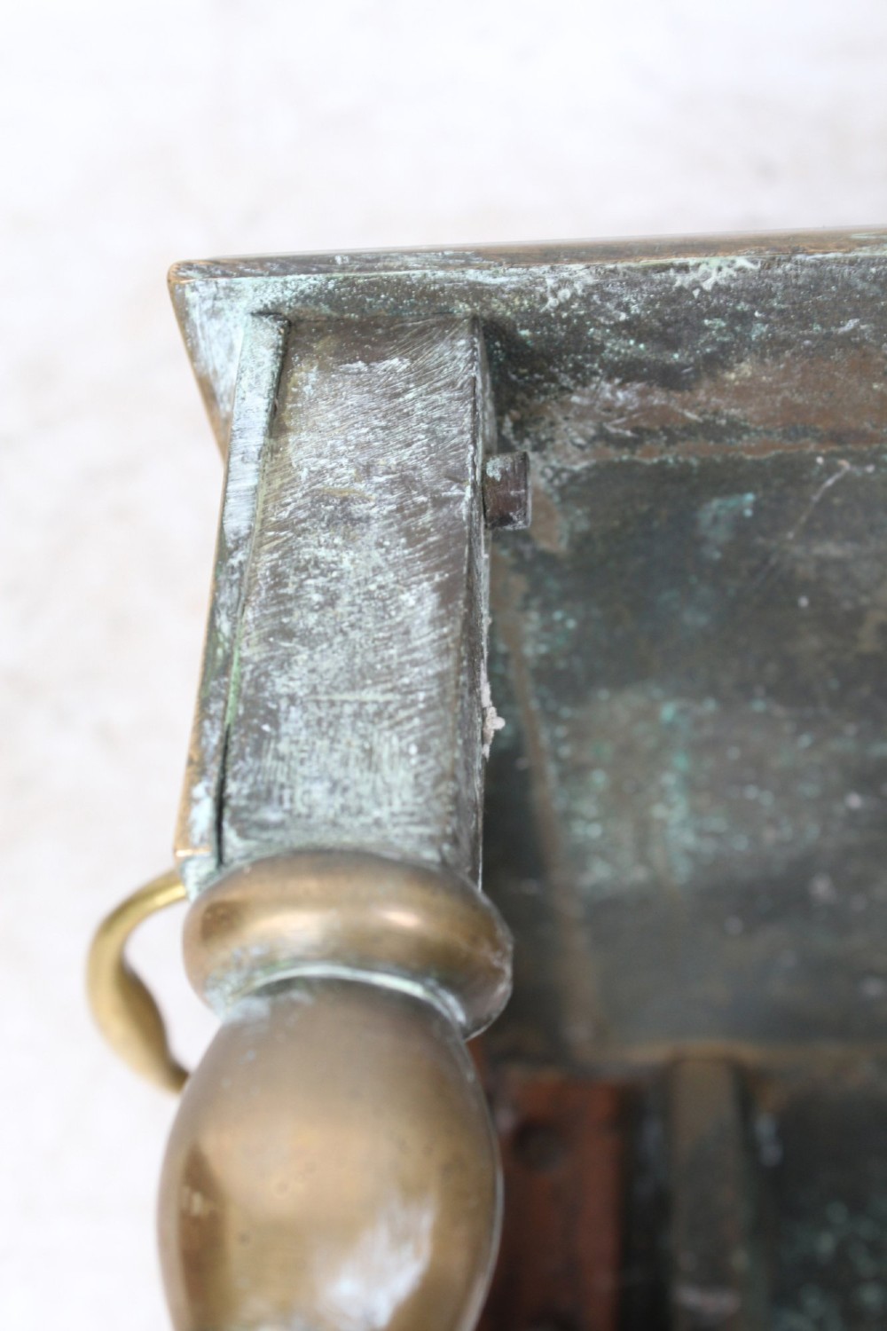 An antique Georgian brass footman featuring cabriole front legs, turned rear legs, side drop handles, and a rectangular top surface. View VI