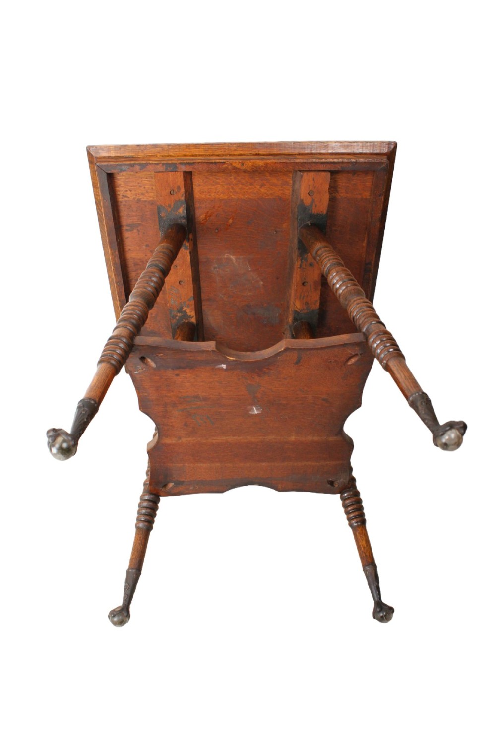 An antique warm brown oak side table featuring bobbin-turned legs, a lower rectangular shelf, and claw feet. View XI