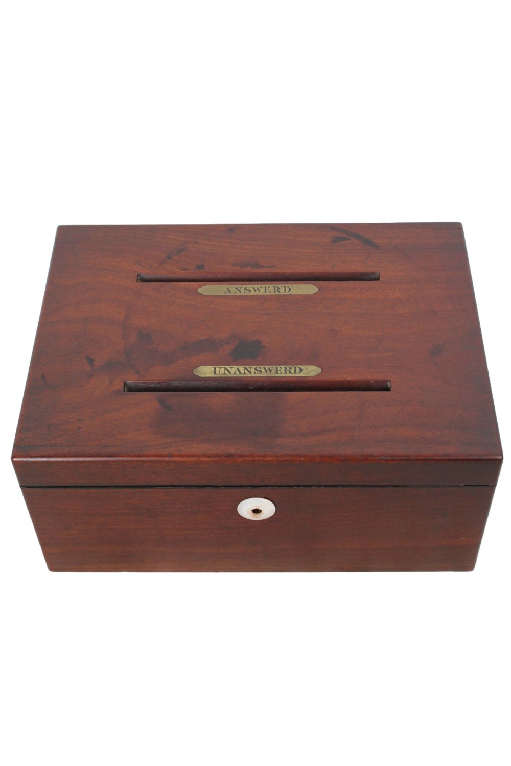 A Victorian mahogany letter box featuring two top slots labeled Answerd and Unanswerd with brass plaques and a circular keyhole escutcheon on the front.