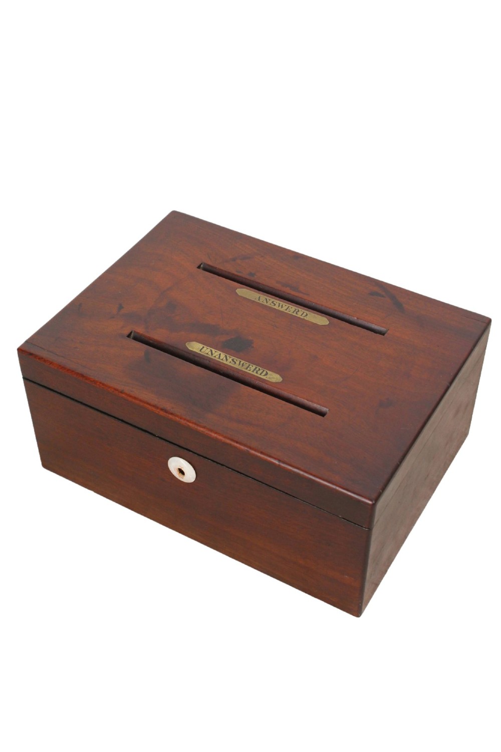 A Victorian mahogany letter box featuring two top slots labeled Answerd and Unanswerd with brass plaques and a circular keyhole escutcheon on the front. View III