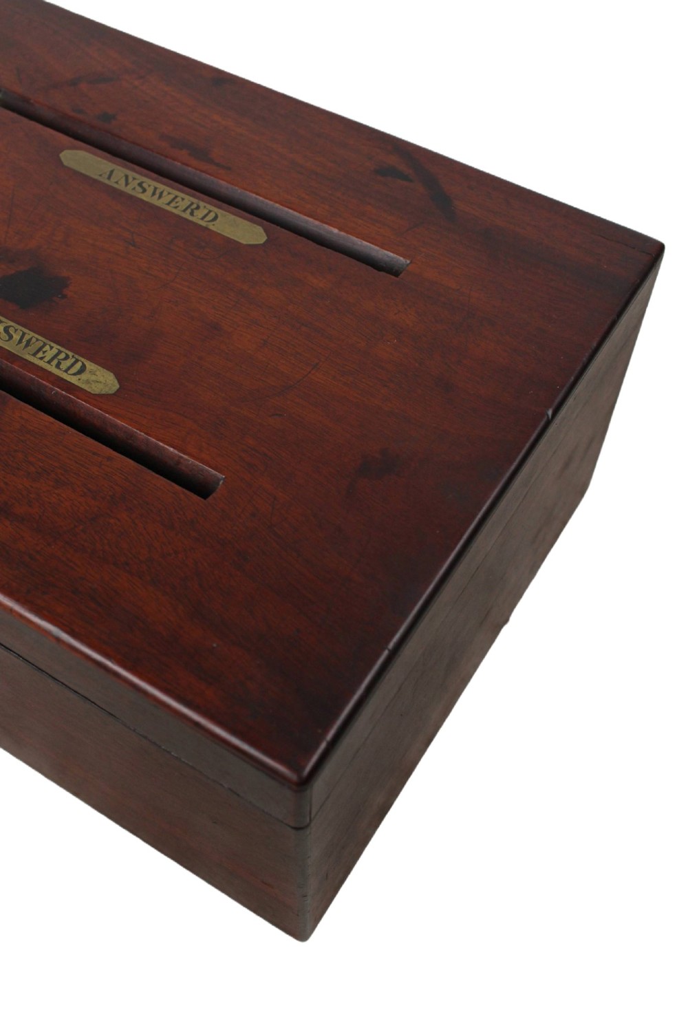 A Victorian mahogany letter box featuring two top slots labeled Answerd and Unanswerd with brass plaques and a circular keyhole escutcheon on the front. View XI