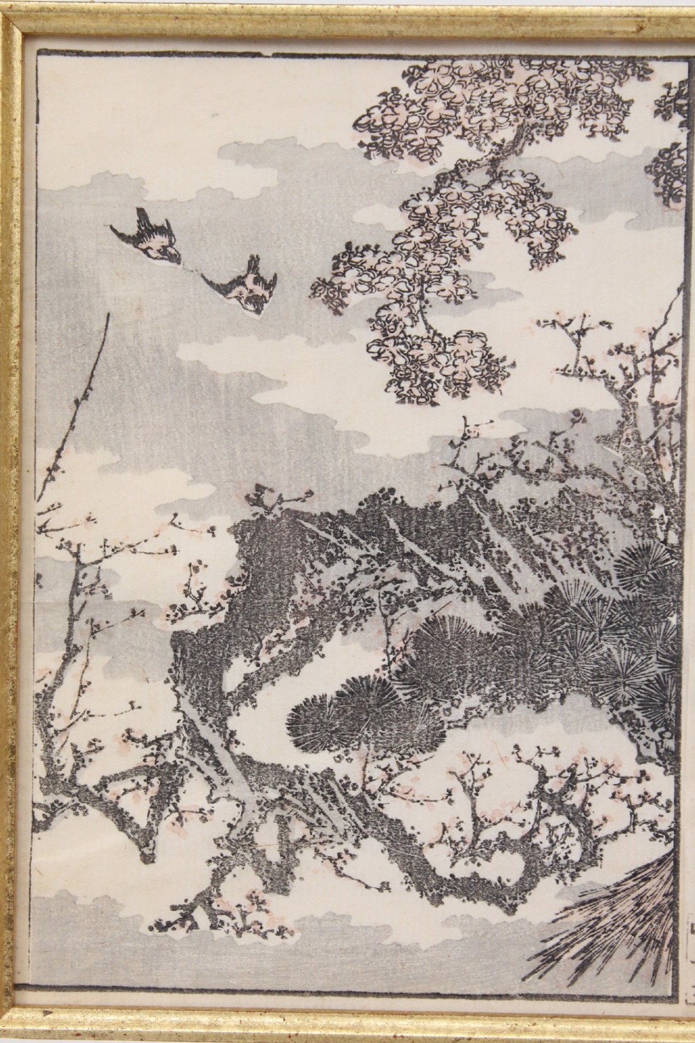 A pair of framed Japanese woodblock prints featuring detailed figurative and landscape illustrations mounted in cream mats within dark wooden frames. View VIII