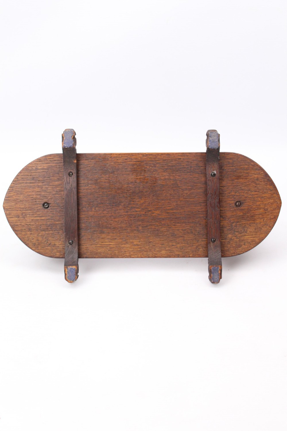 A dark oak desktop book stand featuring pointed arch uprights, carved mythical creature side accents, and scroll feet. View VII
