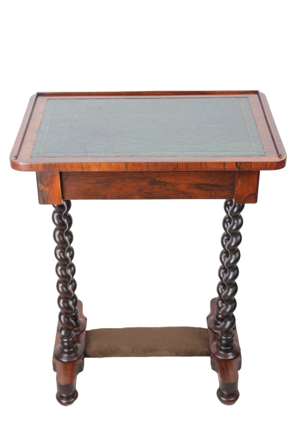 A small Regency rosewood side table featuring an inset green leather top with gold leaf tooling, supported by twin barley twist columns on a trestle base.