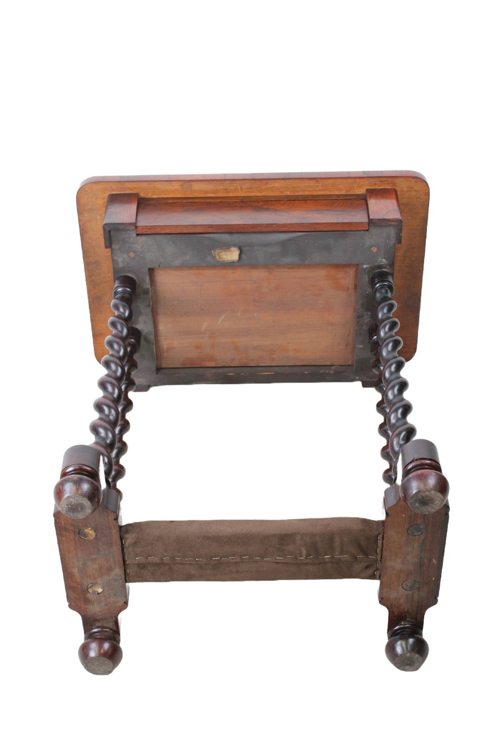 A small Regency rosewood side table featuring an inset green leather top with gold leaf tooling, supported by twin barley twist columns on a trestle base. View VII
