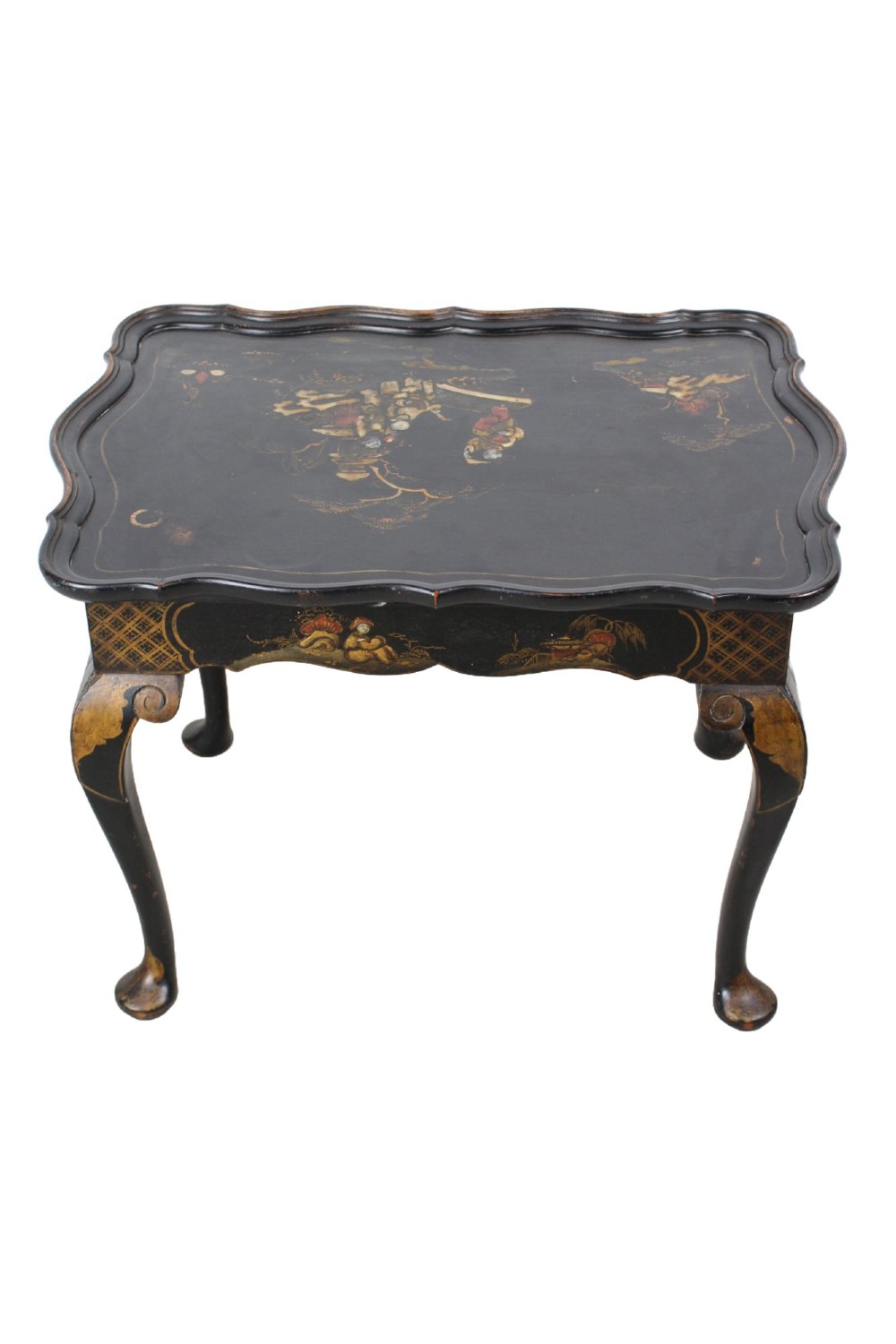 A low black lacquered Edwardian coffee table featuring gilded Chinoiserie figures, a serpentine tray-top edge, and cabriole legs. View VI