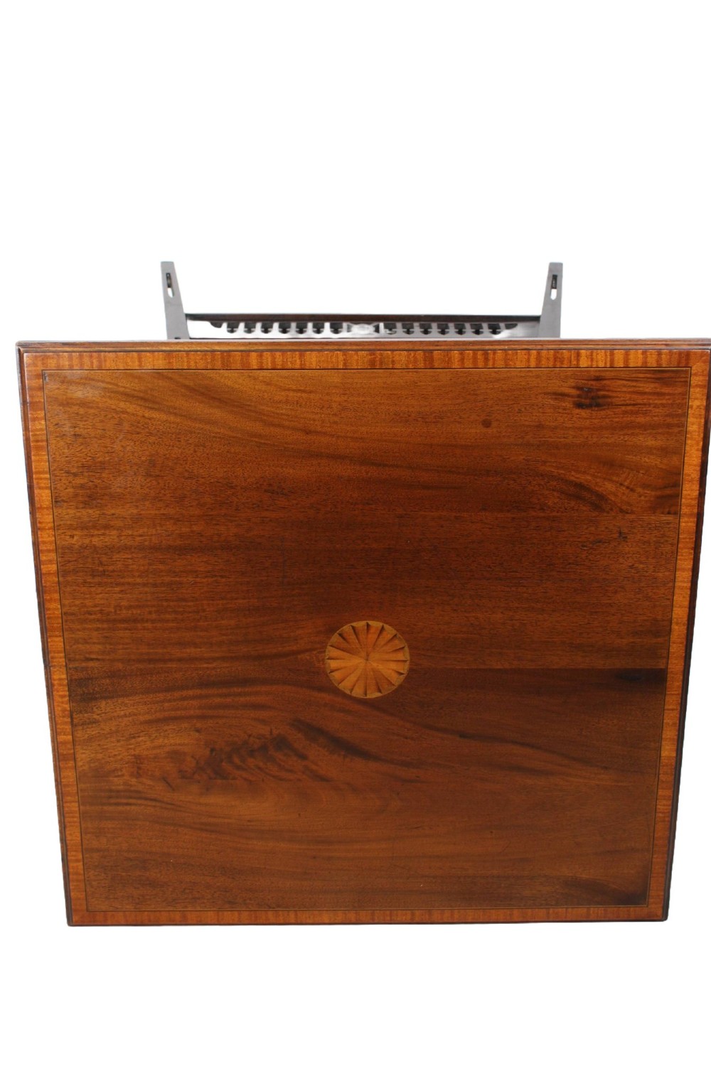 An Edwardian mahogany square side table featuring a central inlaid sunburst medallion, crossbanded border, and a lower undertier shelf with a pierced gallery. View XI