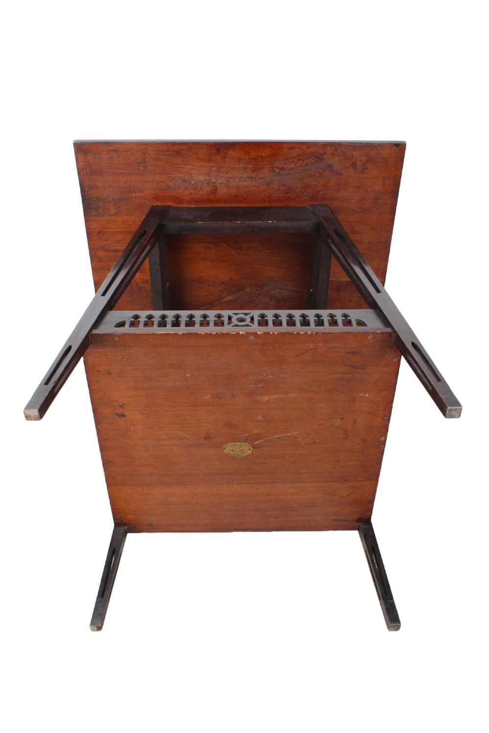 An Edwardian mahogany square side table featuring a central inlaid sunburst medallion, crossbanded border, and a lower undertier shelf with a pierced gallery. View XII