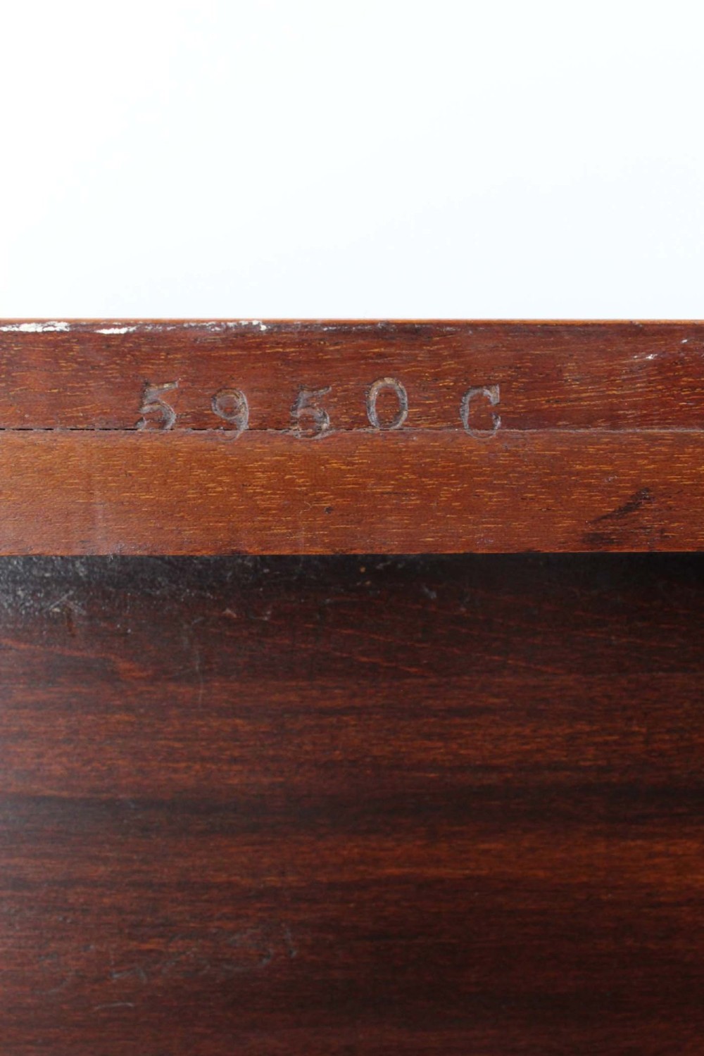 An Edwardian mahogany bedside cabinet featuring satinwood stringing inlay, a single panelled door with a brass handle, and square tapered legs. View VII