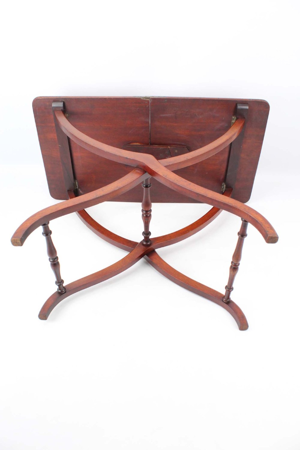 A Victorian mahogany coaching table featuring a rectangular folding top supported by curved X-frame legs and turned stretchers. View V