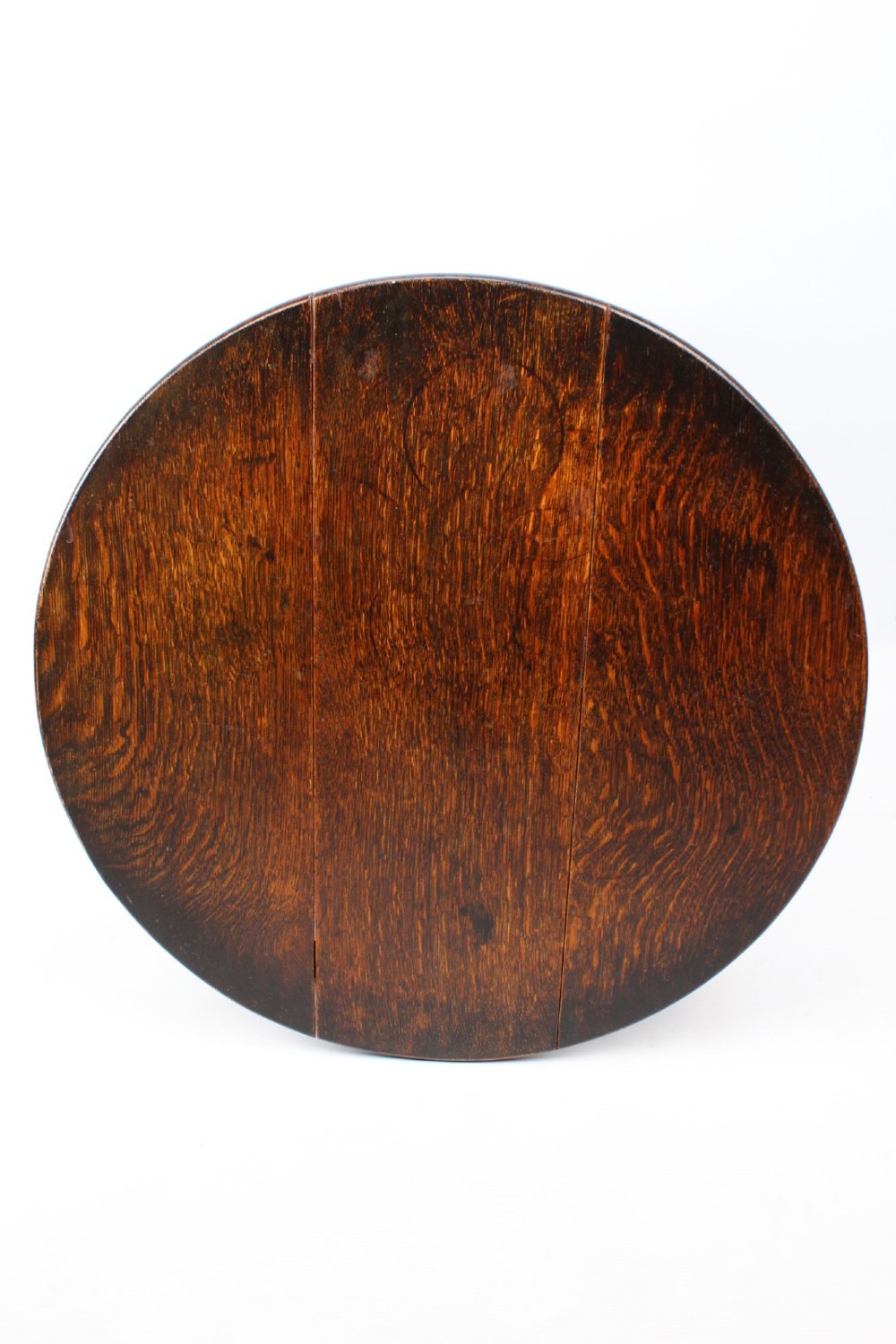 A dark oak drop-leaf coffee table featuring hinged side flaps, turned legs, and a sturdy trestle base. View XI