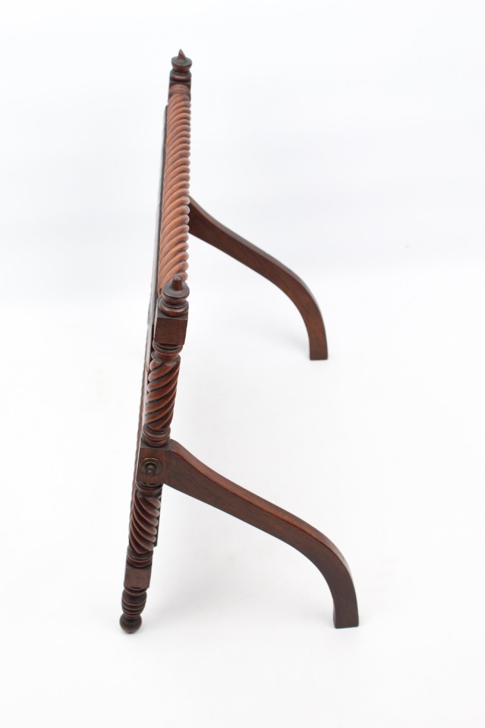 An antique Regency mahogany toilet mirror featuring a swivelling rectangular glass frame supported by rope-twist turned pillars with finials. View IV