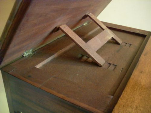 fig 1. A Late Geo III mahogany reading and writing table
