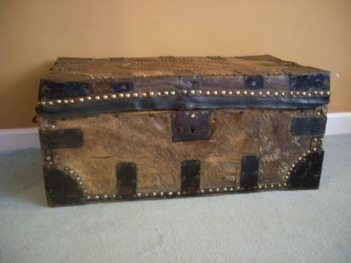 An Early 19th Leather and Iron Bound Trunk
