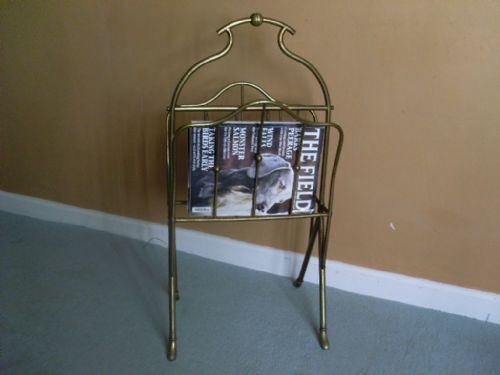 An Early 20thc Brass Magazine Rack or Stand