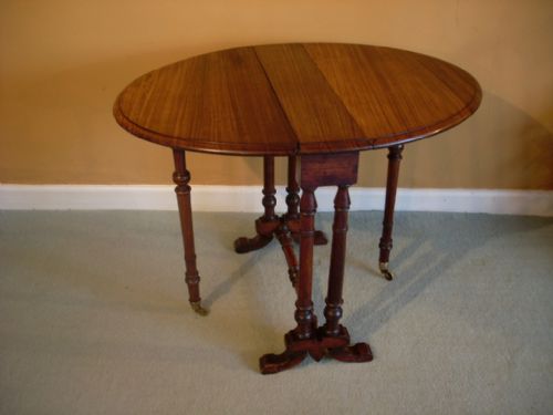 An Early Victorian Rosewood Sutherland Table
