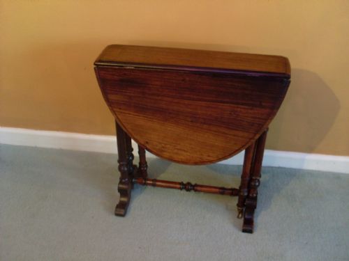 fig 1. An early Victorian rosewood sutherland table