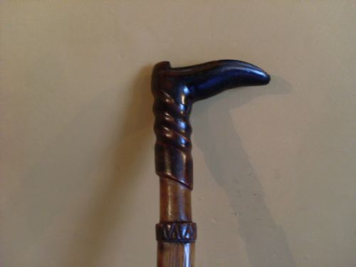 A 19thc Walking Cane with Carved Boot Handle