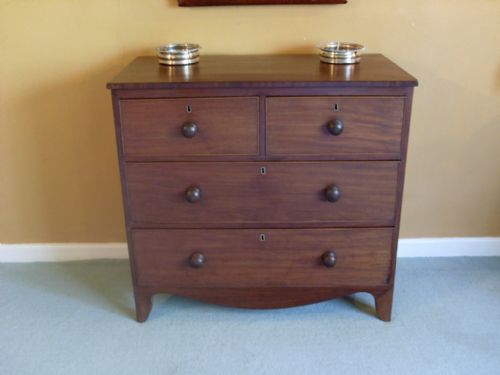 A Small Late Regency Chest of Drawers