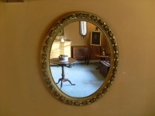 A Grand Gilded Victorian Oval Wall Mirror