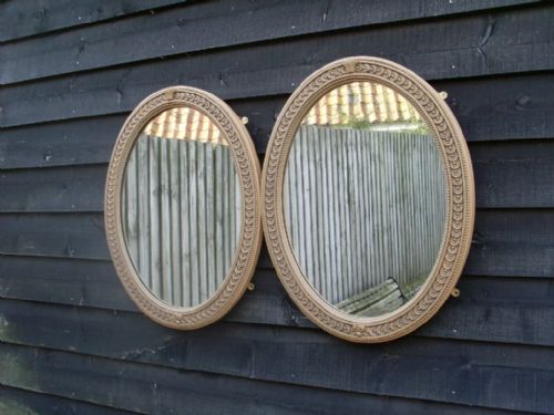 A Pair of Victorian Oval Wall Mirrors