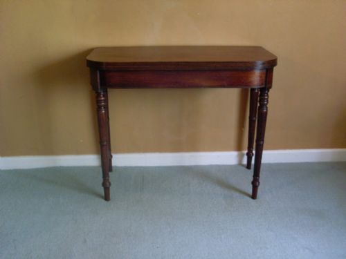 A Georgian Mahogany Tea Table Suitable for a Hall.