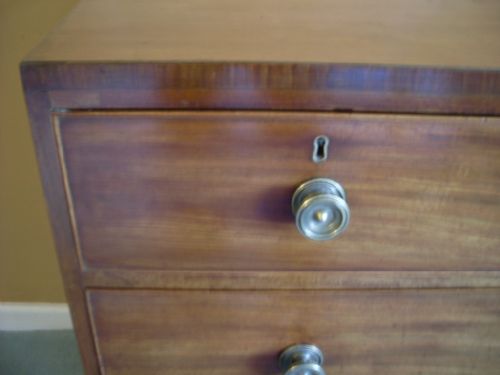 fig 1. A small Regency chest with kick out feet.
