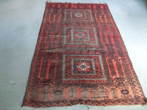An Antique Rug 206 X 108 Cms