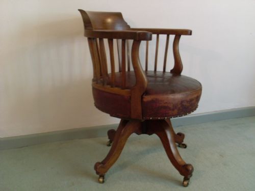A Victorian Revolving Desk Chair with Leather Seat