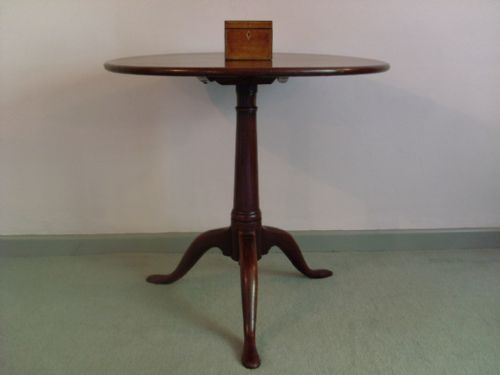 A Georgian Tilt Top Tripod Table with One Piece Top