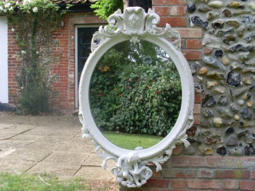 A Substantial and Decorative 19thc Oval Wall Mirror