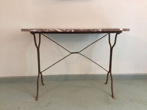 A French Marble Topped Table with an Iron Base