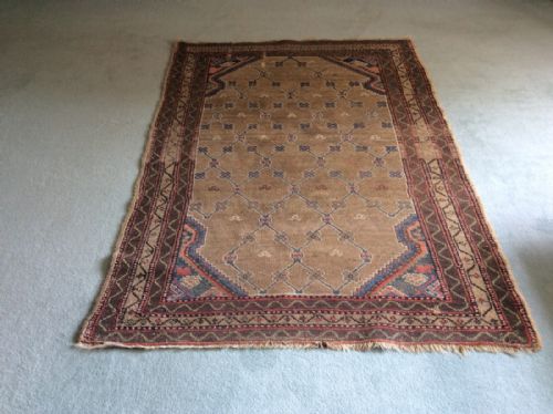 An Antique Hand Woven Rug