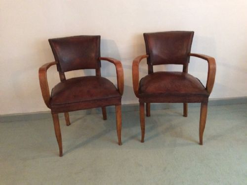 A Pair of French Leather Covered Bridge Chairs