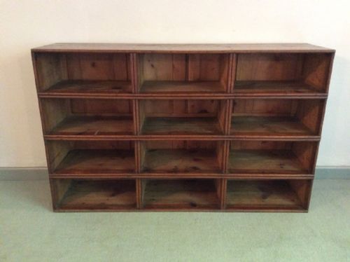 A 12 Section Oak Pigeon Hole Display Unit
