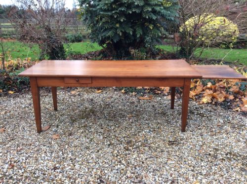An All Cherry Wood 8/10 Seat Dining Table