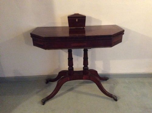 fig 1. A Regency rosewood brass inlaid hall table