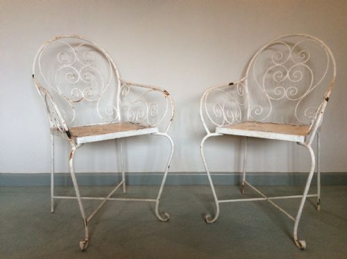 A Pair of French Iron Garden Chairs