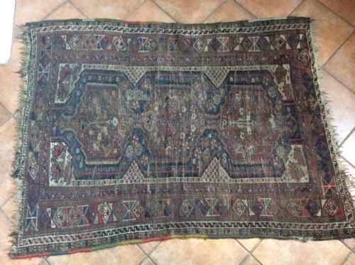 A Small Antique Hall Rug