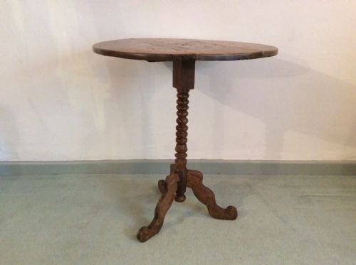 An Antique French Oak Tripod Table