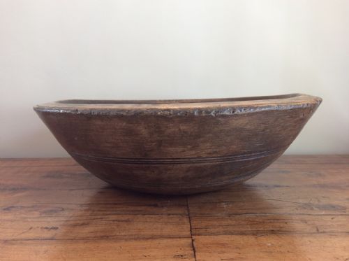 A Large Antique Sycamore Dairy Bowl