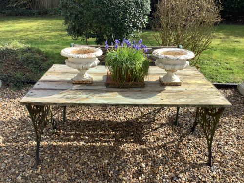A PAIR OF CAST IRON TABLE URNS - ADDITIONAL PHOTO 1