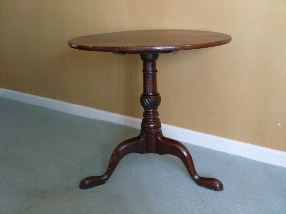 A Georgian country oak tripod table